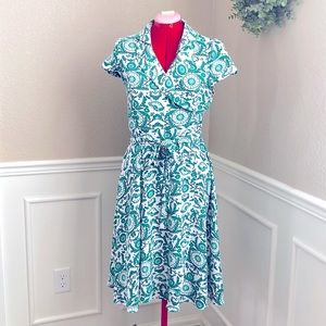 Eva Mendes green/white pattern wrap dress